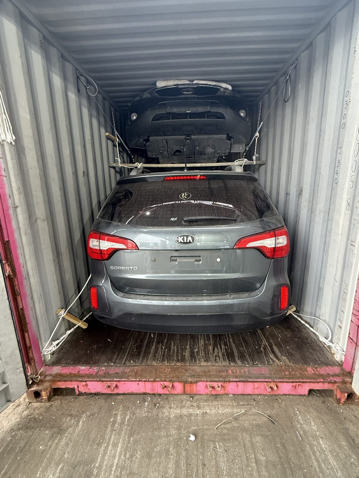 Kia Sorento loaded inside 40ft container with double-deck shoring by AMAR LOGIS